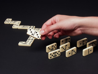 hand with domino