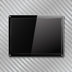 Black plate on metal striped background