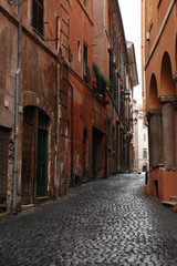 Fototapeta na wymiar Narrow Street In Rome