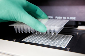 Green gloves, Thermal PCR cycler, DNA copy, close