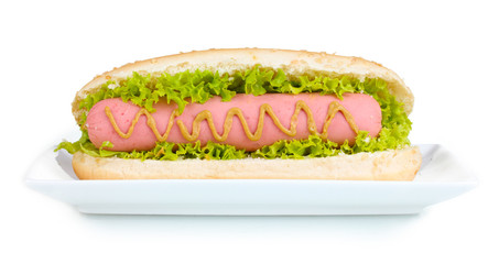 Delicious hot dog with mustard and lettuce isolated on white