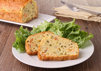 plate of cake slice and salad