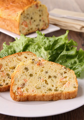 plate of cake slice and salad