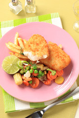 Fried fish with French fries and mixed vegetables