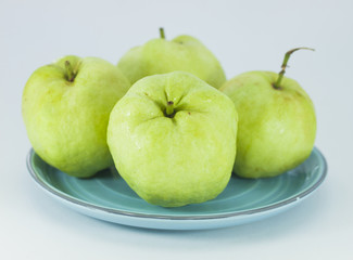 Guava fruit has green skin and white flesh, vitamin C.