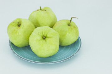 Guava fruit has green skin and white flesh, vitamin C.