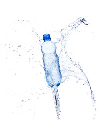 Water splashing out of bottle, isolated on white background