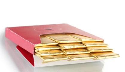 single chewing gum wrapped in standard red packaging isolated