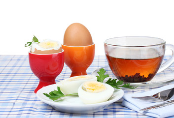 delicious breakfast of boiled eggs and tea