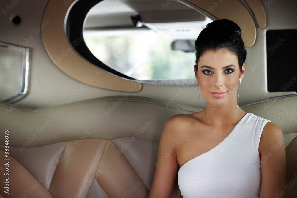 Sticker beautiful elegant woman sitting in limousine