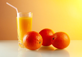 oranges and glass with juice.