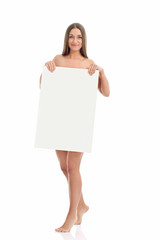 Beautiful naked woman holding a blank sign