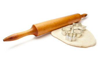 Rolling pin with dough and cookie forms
