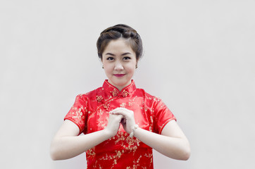 happy Chinese new year. beautiful Asian woman with gesture of co