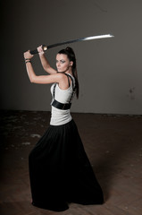 Woman Wielding Traditional Sword