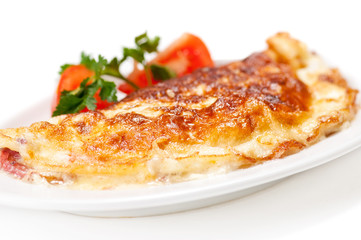 Omelet with herbs and tomatoes