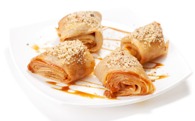 Rolled pancakes with caramel mousse