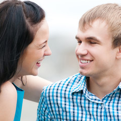Portrait of a beautiful young happy smiling couple
