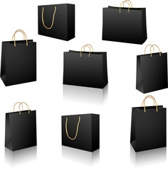 Black shopping bags vector set isolated on white