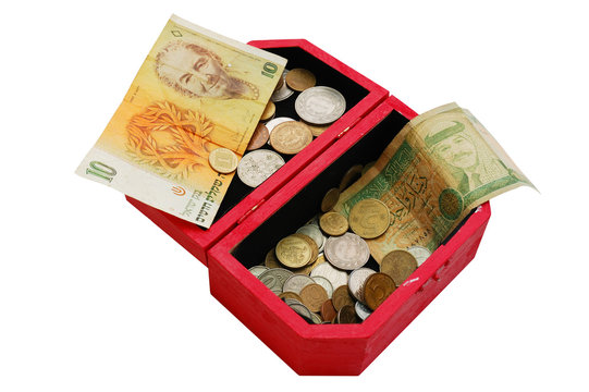 old banknotes and coins in wooden casket