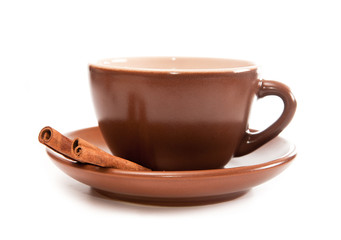 Ceramic cup of coffee with cinnamon