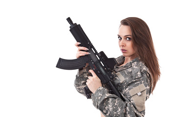 Fototapeta premium Young woman soldiers with gun