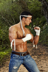 fit male on a fighter position