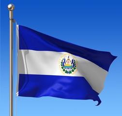 Flag of El Salvador  against blue sky.