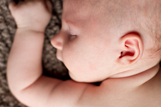 Close up ear shot of newborn baby