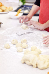 Fototapeta na wymiar dough and hands closeup