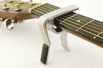 Capo Fitted to an Accoustic Guitar