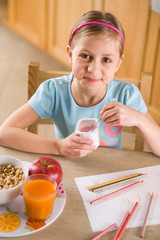 girl eating yoghurt © mbt_studio