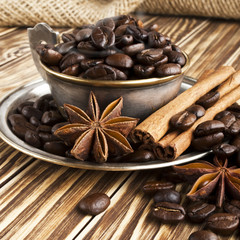 coffee beans in a silver cup