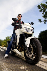 Obraz na płótnie Canvas man with a motorcycle