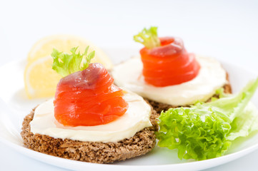 Canapes with salmon.
