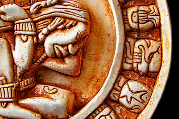 Closeup of glyphs on a Mayan calendar