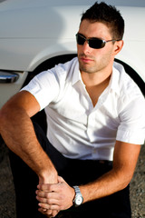 man with white convertible