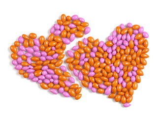 Two dragee candy hearts