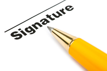 Pen and signature isolated on white