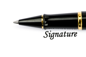 Pen and signature isolated on white