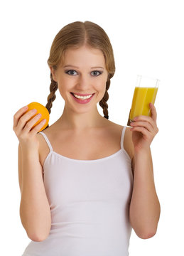 beautiful young woman full of life with orange juice