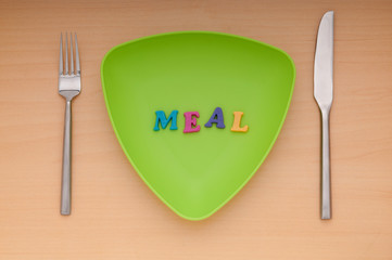 Plate with letters on the white background