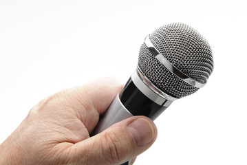 Hand mit Mikrofon