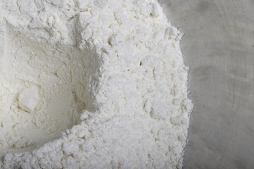 Flour in a metallic bowl