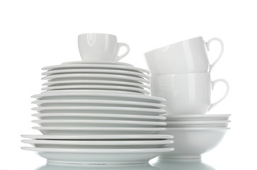 empty bowls, plates and cups isolated on white