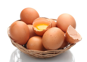 chicken eggs in a nest isolated on white
