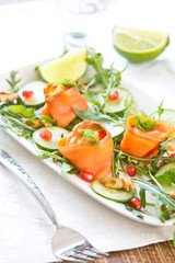 Smoked salmon with pomegranate and walnut salad