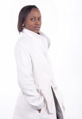Gorgeous young South African woman in white coat