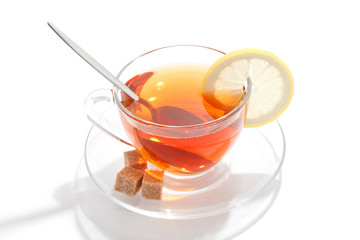 Glass cup of tea with white background