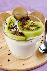 yogurt with fresh sweet kiwi and chocolate sprinkles